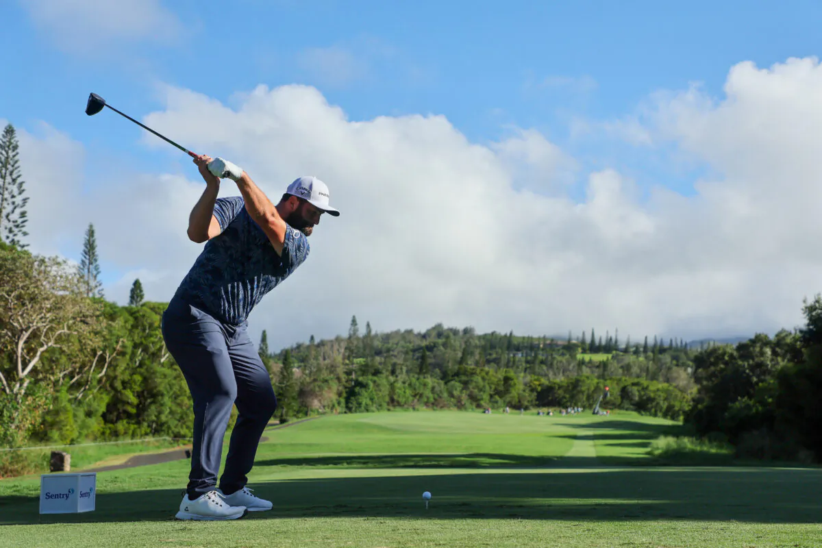 Jon Rahm of Spain plays his shot from the 15th tee during the first round of the Sentry Tournament of Champions at Plantation Course at Kapalua Golf Club in Lahaina, Hawaii, on Jan. 5, 2023. (Andy Lyons/Getty Images)