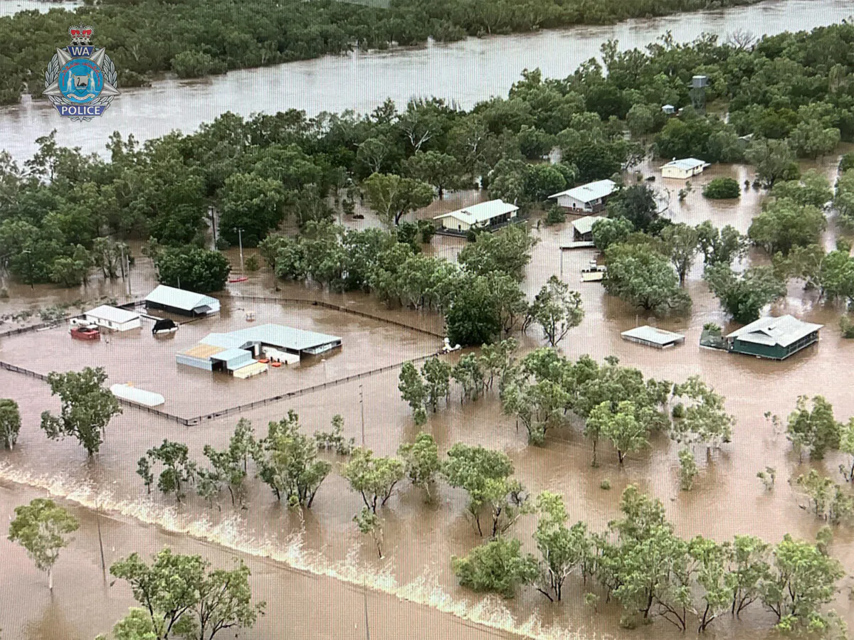 A supplied image obtained on Jan. 6, 2023 shows an aerial view of flooding at Fitzroy crossing in the Kimberley region of Western Australia. A 50 km-wide inland sea is surging towards the Kimberley coast after the swollen Fitzroy River devastated the town of Fitzroy Crossing earlier in the week. (AAP Image/Supplied by Western Australia Police Force)
