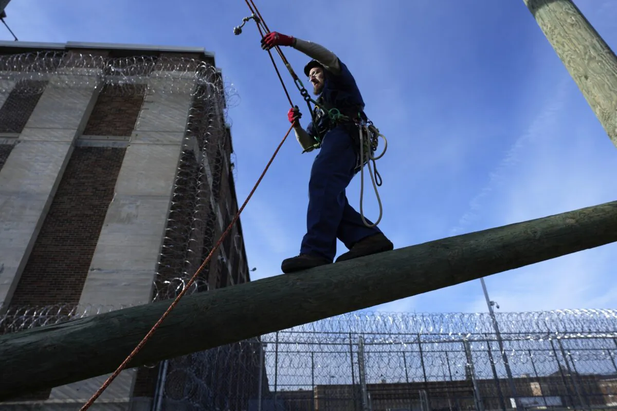 Prisoner Scott Steffes works on climbing at the Parnall Correctional Facility's Vocational Village in Jackson, Mich., on Dec. 1, 2022. (Paul Sancya/AP Photo)