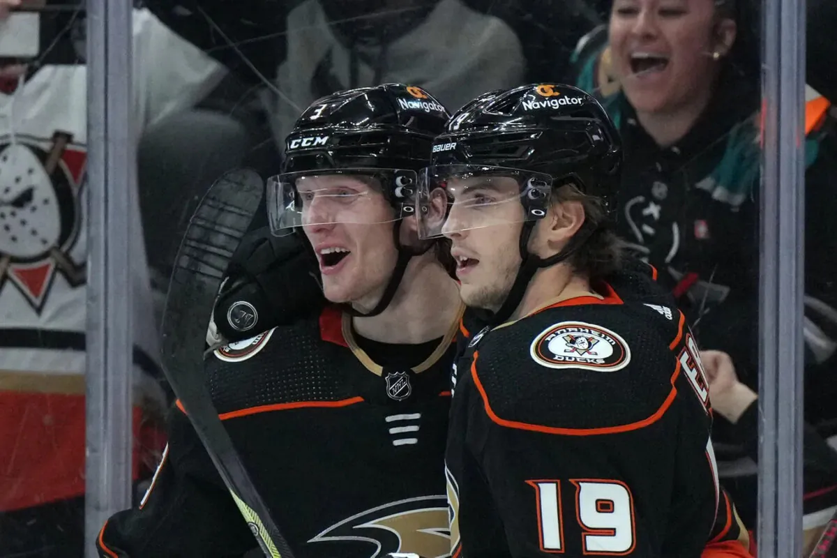 Anaheim Ducks defenseman John Klingberg (3) celebrates with right wing Troy Terry (19) after scoring the winning goal in overtime against the San Jose Sharks at Honda Center in California, on Jan. 6, 2023. (Kirby Lee/USA TODAY Sports via Field Level Media)