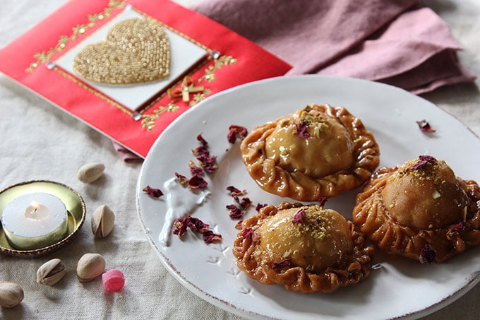 Pistachio and Apricot Pastries (Chandrakala) in Rose Syrup