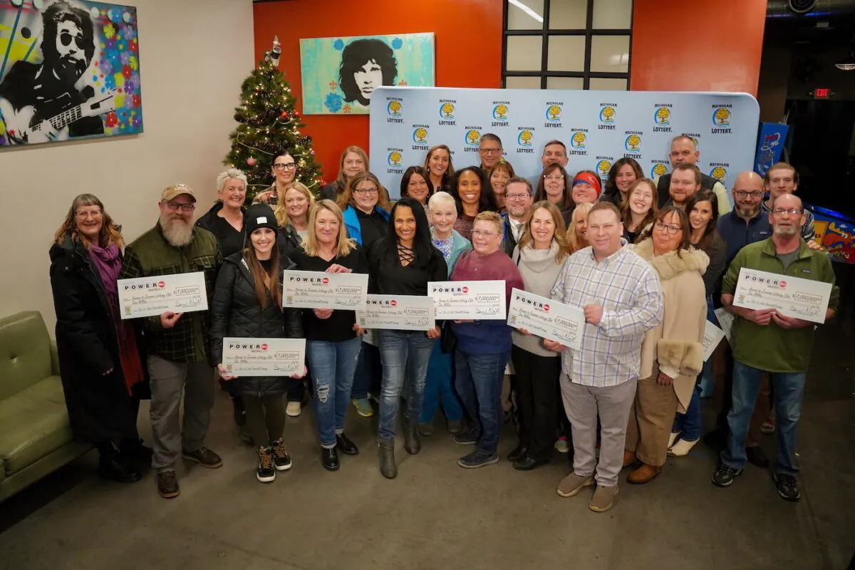 Bernard Bossert Jr. (first row/R-L) and his lottary club in Traverse City, Mich., on Jan. 5, 2023. (Michigan State Lottery)