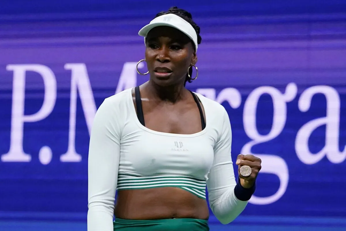 Venus Williams, of the United States, reacts during her first-round doubles match with Serena Williams, against Lucie Hradecka and Linda Noskova, of the Czech Republic, at the U.S. Open tennis championships, N.Y., on Sept. 1, 2022. (Frank Franklin II/AP Photo)