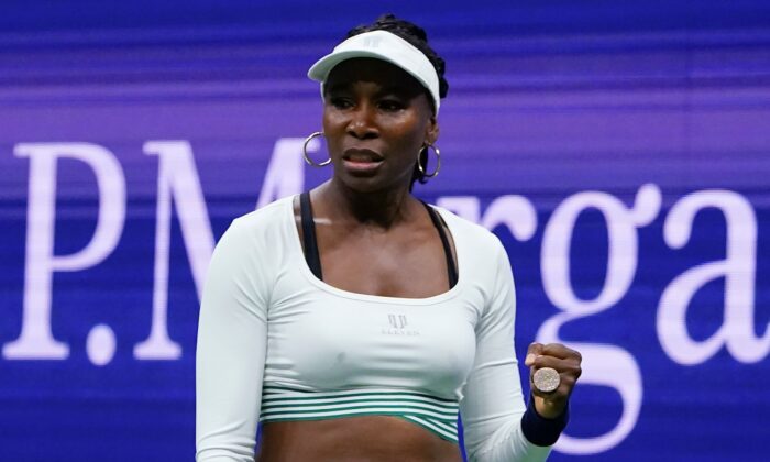 Venus Williams, of the United States, reacts during her first-round doubles match with Serena Williams, against Lucie Hradecka and Linda Noskova, of the Czech Republic, at the U.S. Open tennis championships, N.Y., on Sept. 1, 2022. (Frank Franklin II/AP Photo)