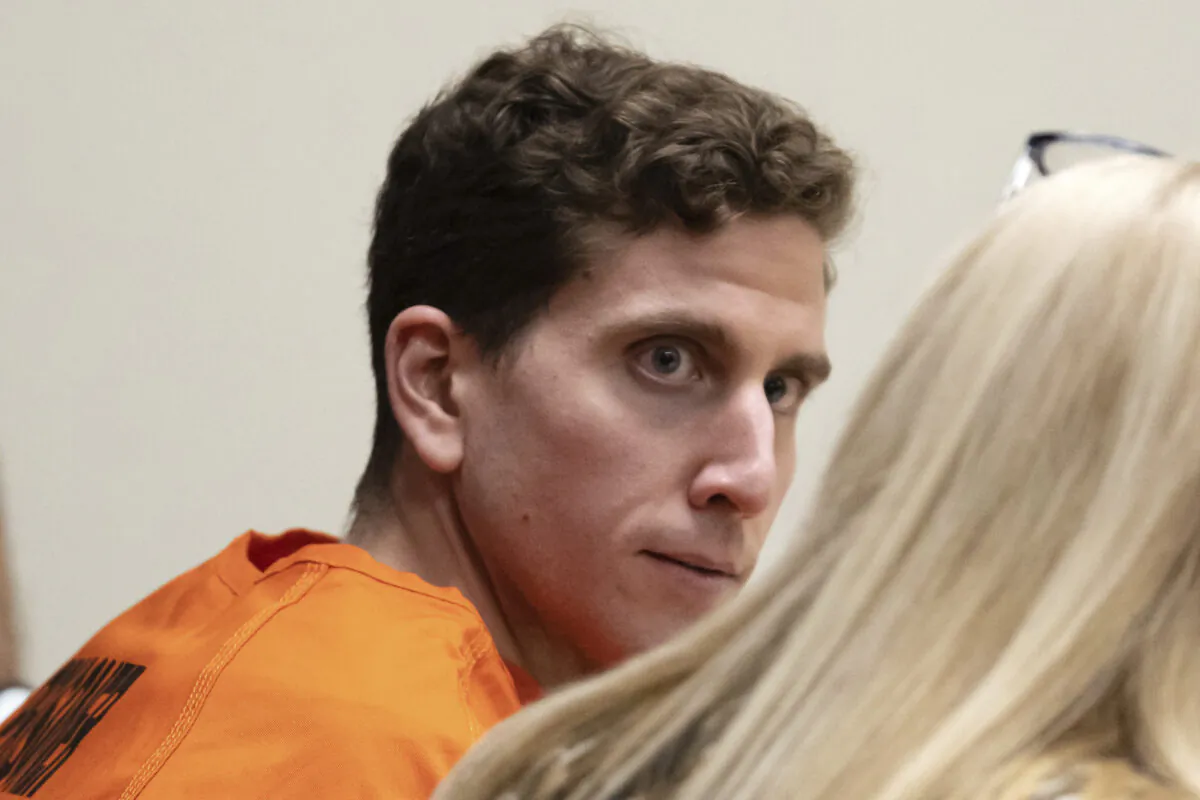 Bryan Kohberger, (L), who is accused of killing four University of Idaho students in November 2022, looks toward his attorney, public defender Anne Taylor, (R), during a hearing in Latah County District Court in Moscow, Idaho, on Jan. 5, 2023. (Ted S. Warren/AP Photo, Pool)