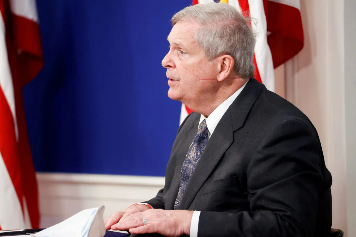 Secretary of Agriculture Tom Vilsack speaks during a video conference with farmers, ranchers, and meat processors held by President Joe Biden from an auditorium on the White House campus in Washington on Jan. 3, 2022. (Jonathan Ernst/Reuters)