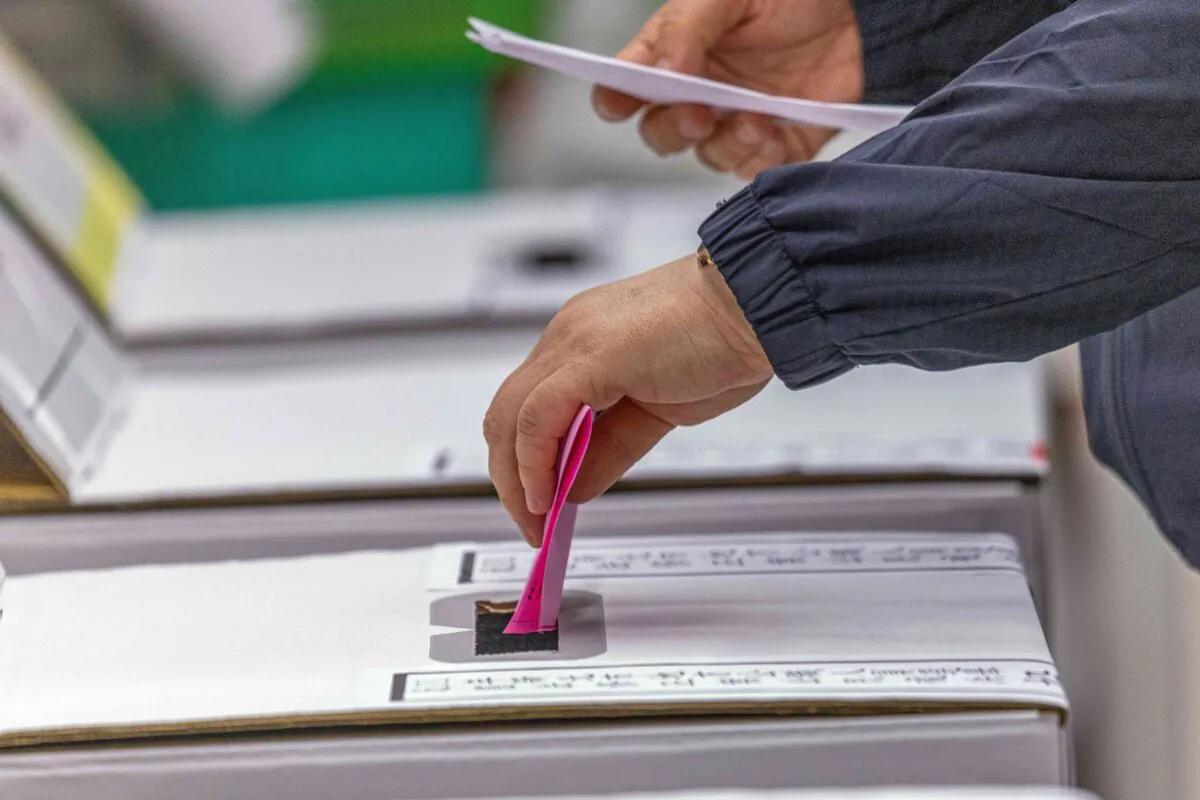 A man votes in New Taipei City, Taiwan, on Nov. 26, 2022. (Annabelle Chih/Getty Images)