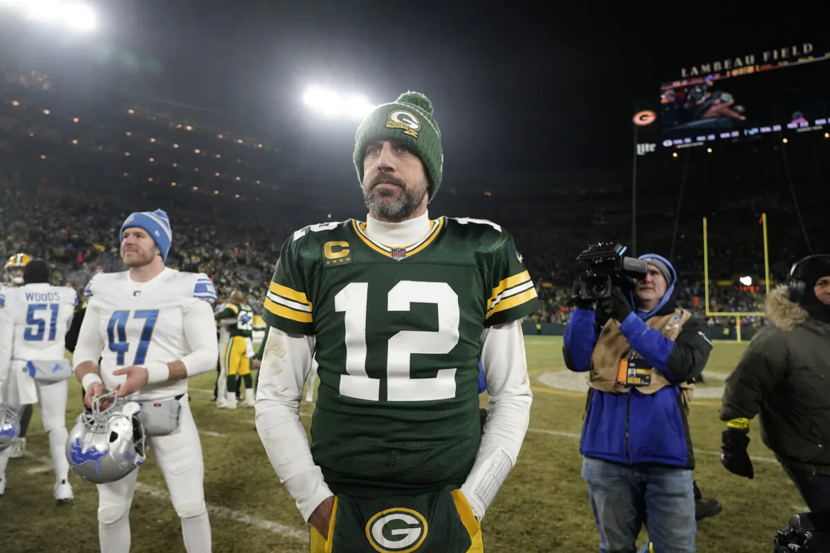 Green Bay Packers quarterback Aaron Rodgers stands on the field following an NFL football game against after losing to the Detroit Lions 20–16 in Green Bay, Wis., on Jan. 8, 2023. (Morry Gash/AP Photo)