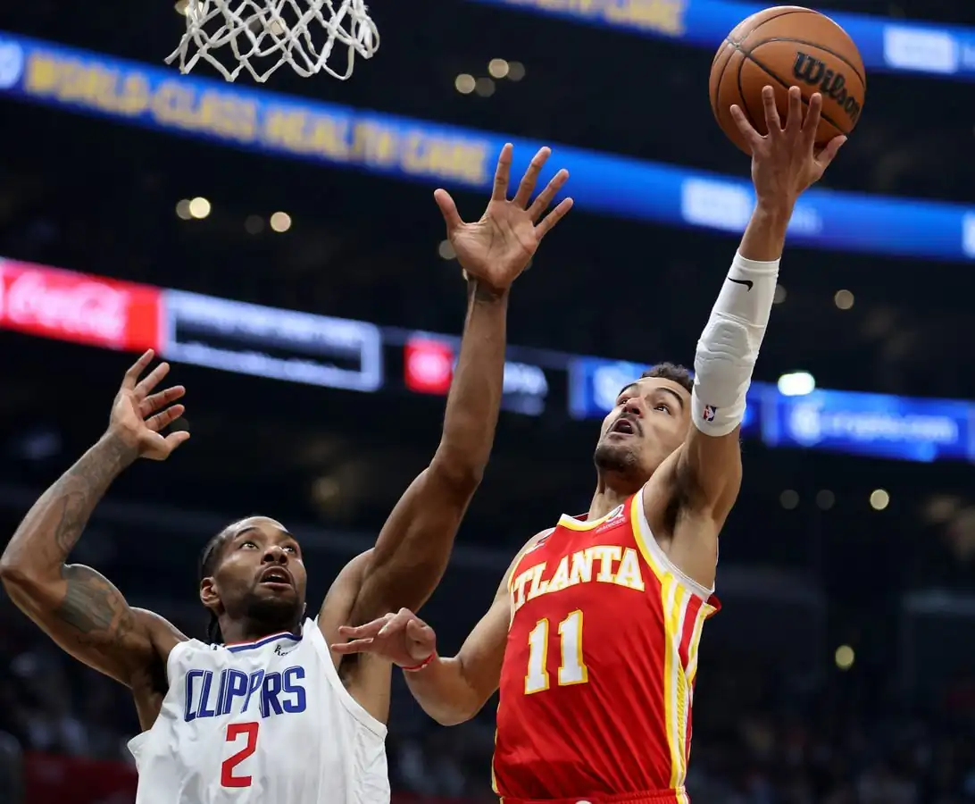Atlanta Hawks guard Trae Young (11) shoots the ball against Los Angeles Clippers forward Kawhi Leonard (2) during the second quarter in Los Angeles on Jan. 8, 2023. (Kiyoshi Mio/USA TODAY Sports via Field Level Media)