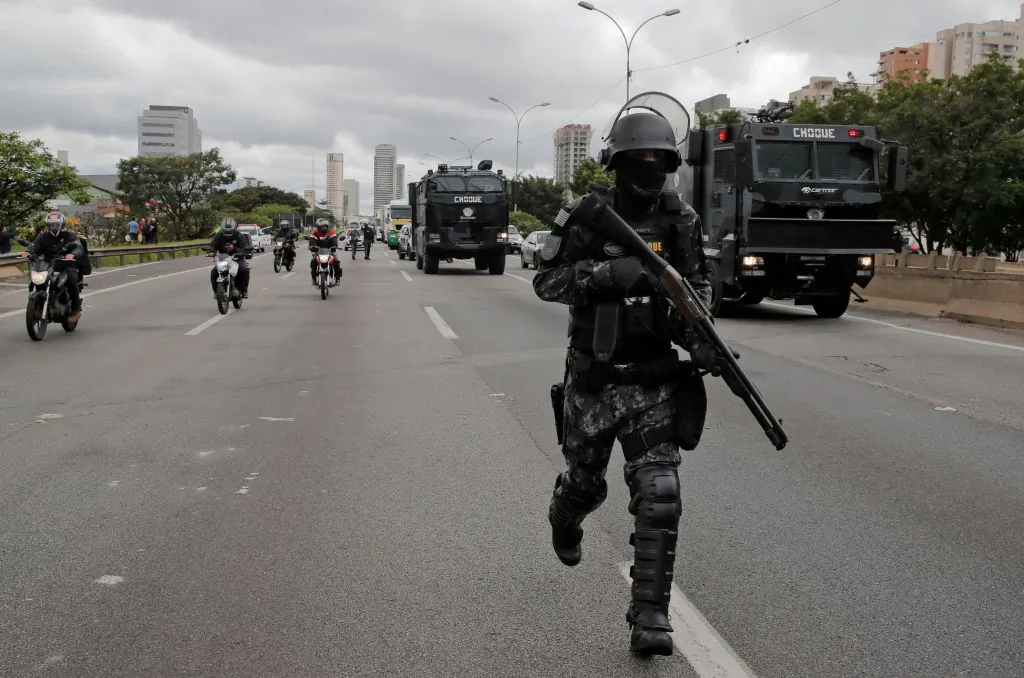 Military Police shock troop arrive at a blockade by supporters of President Jair Bolsonaro on Castelo Branco highway, on the outskirts of Sao Paulo, Brazil, on Nov. 1, 2022. (Caio Guatelli/AFP via Getty Images)
