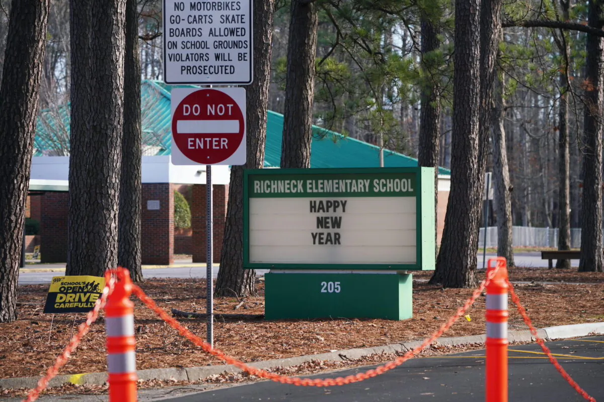 A school sign wishing students a "Happy New Year" is seen outside Richneck Elementary School in Newport News, Virginia, on Jan. 7, 2023. (Jay Paul/Getty Images)