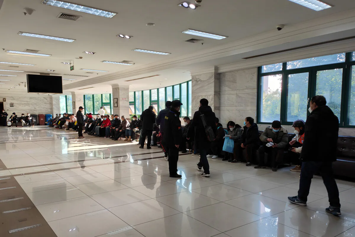 People wait for funeral services for their deceased relatives at Baoxing Funeral Parlor in Shanghai, China, on Jan. 4, 2023. (Wang Gang/VCG via Getty Images)