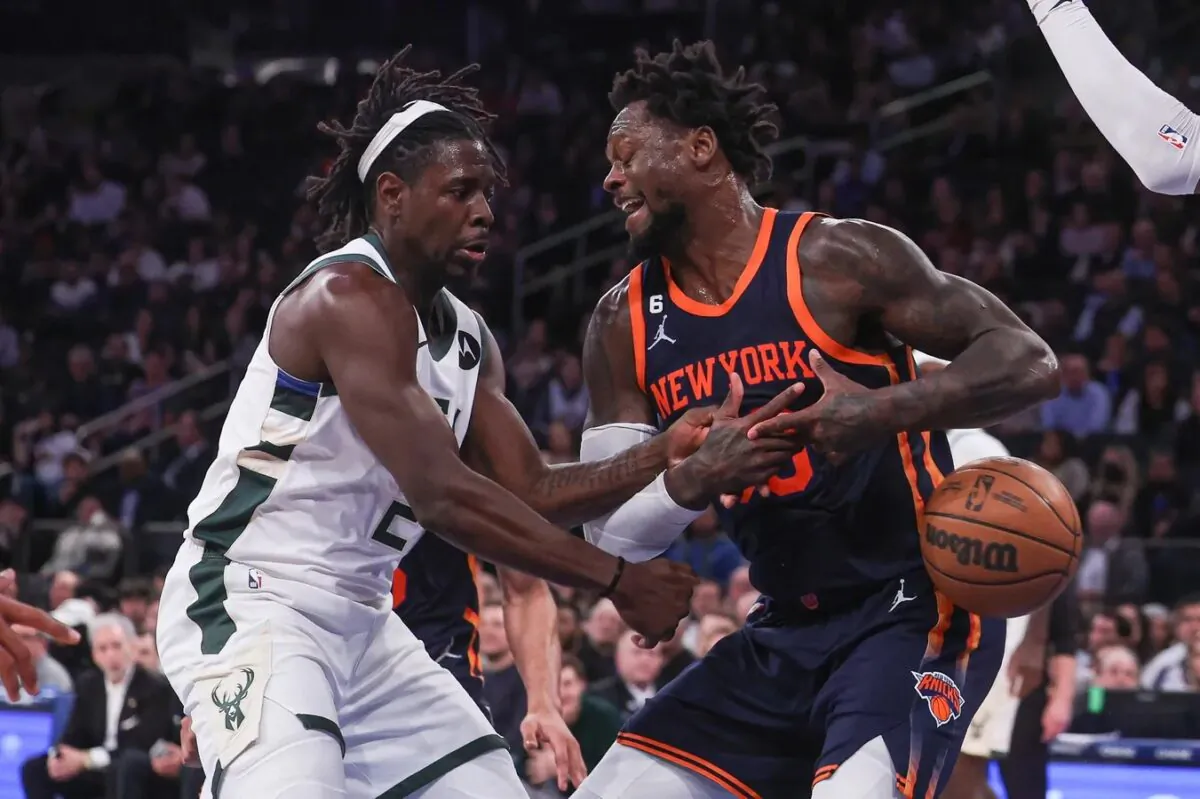 Milwaukee Bucks guard Jrue Holiday (21) knocks the ball away from New York Knicks forward Julius Randle (30) during the fourth quarter at Madison Square Garden in New York on Jan. 9, 2023. (Vincent Carchietta/USA TODAY Sports via Field Level Media)