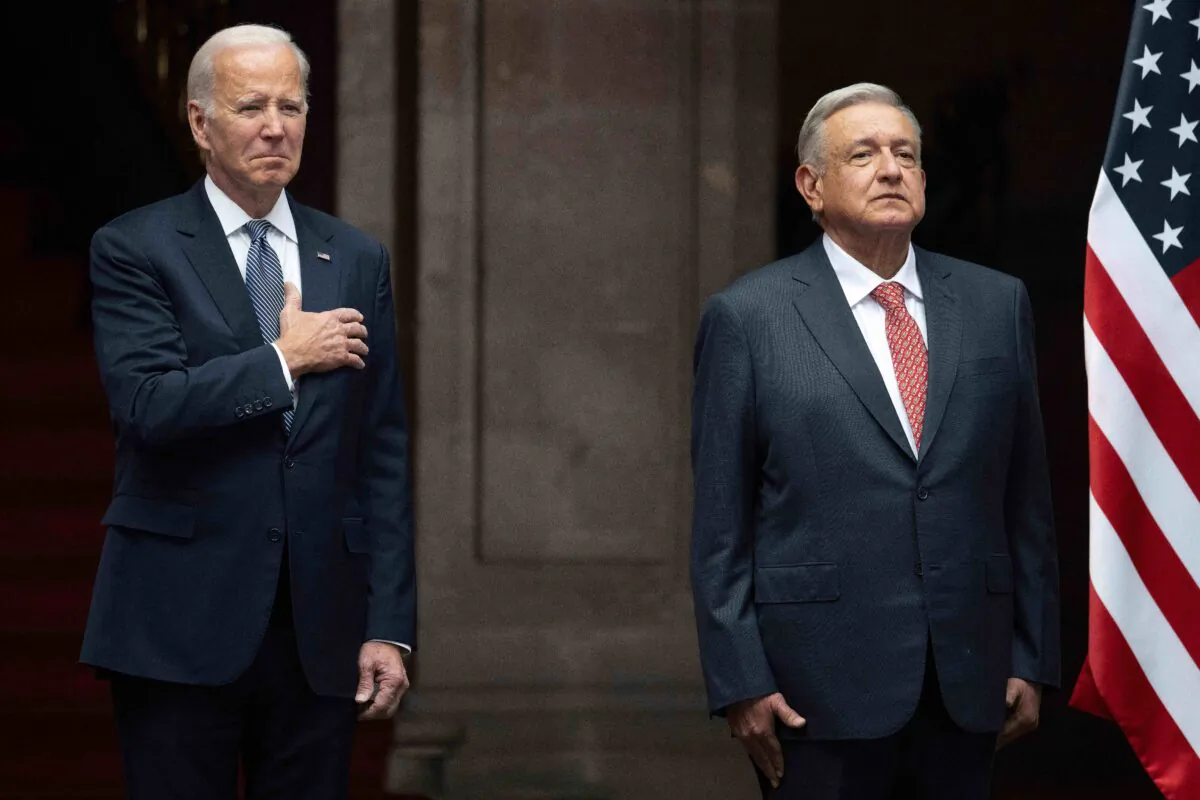 U.S. President Joe Biden (L) and Mexican President Andres Manuel Lopez Obrador stand for the national anthems during an official welcome ceremony at the National Palace in Mexico City on Jan. 9, 2023. (Jim Watson/AFP via Getty Images)