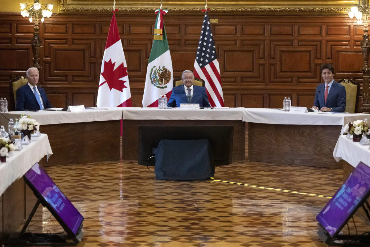(L–R) U.S. President Joe Biden, Mexican President Andres Manuel Lopez Obrador, and Canadian Prime Minister Justin Trudeau attend the 10th North American Leaders Summit at the National Palace in Mexico City on Jan. 10, 2023. (Jim Watson/AFP via Getty Images)