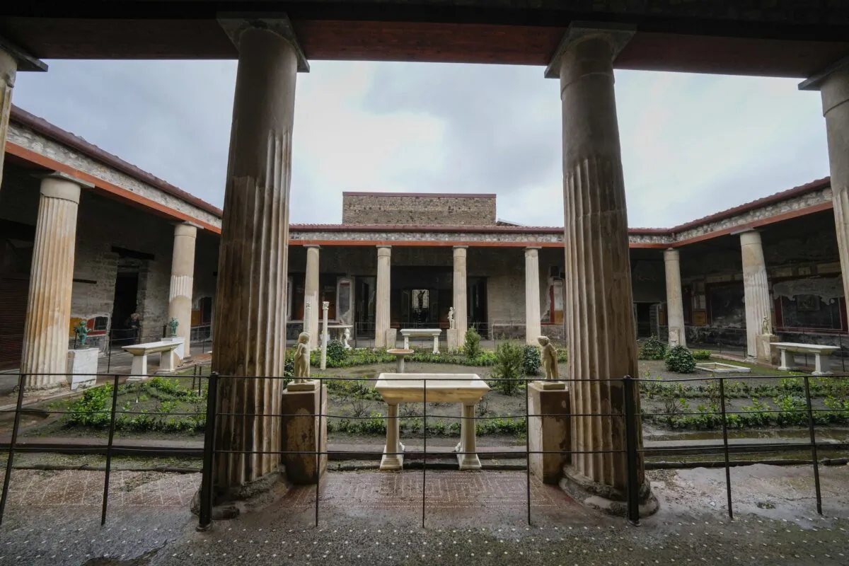 Colums frame the 'peristylium', or courtyard, in the center of the Ancient Roman Domus Vettiorum, House of Vettii, in the Pompeii Archeological Park, near Naples, southern Italy, on Dec. 14, 2022. (Andrew Medichini/AP Photo)