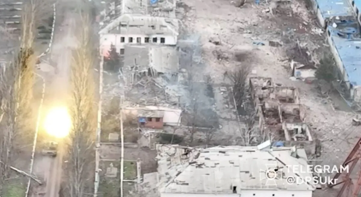 A tank fires a round, amid Russia's attack on Ukraine, in
Soledar, Donetsk region, Ukraine, in this screen grab released on Jan. 8, 2023. (State Border Guard Service of Ukraine/via Reuters)