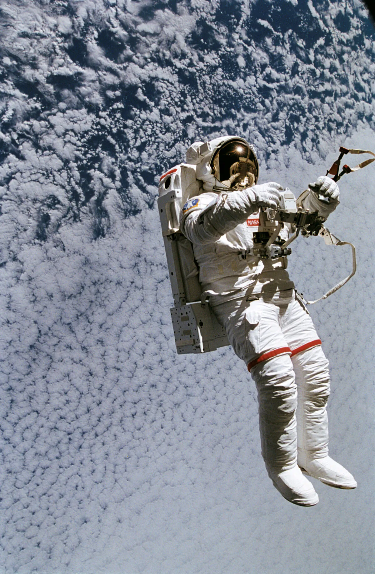 Mark Lee, part of an upcoming Fly with an Astronaut tour, attempts an untethered space walk. (NASA/TNS)