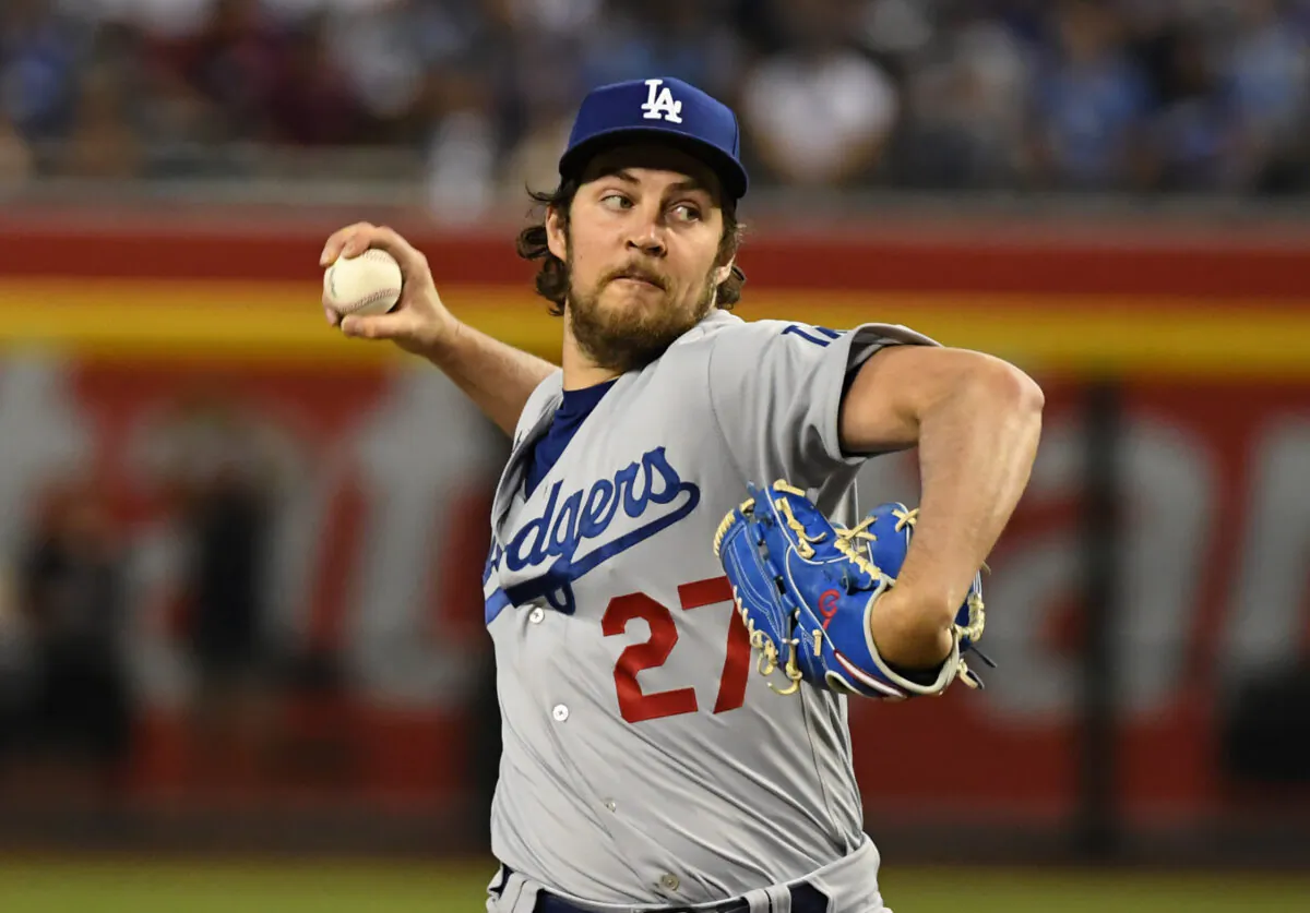 Trevor Bauer (27) of the Los Angeles Dodgers delivers a first inning pitch against the Arizona Diamondbacks at Chase Field in Phoenix on June 18, 2021. (Norm Hall/Getty Images)