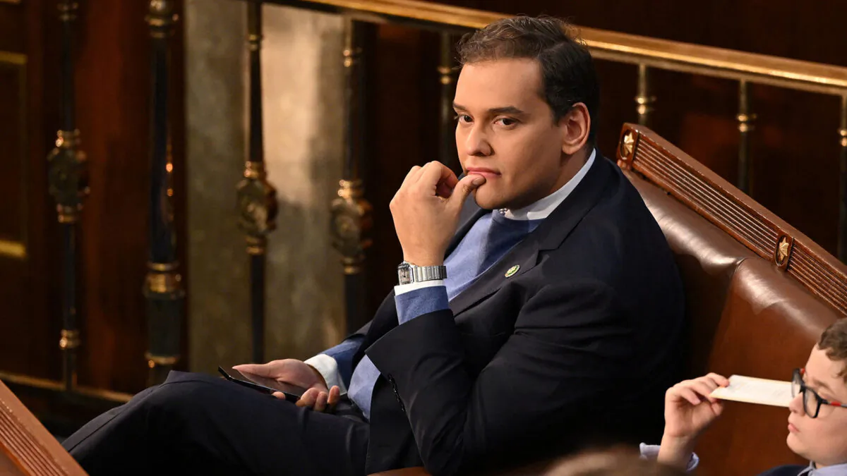 Rep. George Santos (R-N.Y.) looks on as the U.S. House of Representatives convenes for the 118th Congress at the U.S. Capitol in Washington on Jan. 3, 2023. (Mandel Ngan/AFP via Getty Images)
