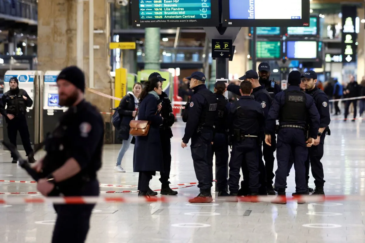 French police secure the area after a man with a knife wounded several people at the Gare du Nord train station in Paris, France, on Jan. 11, 2023. (Benoit Tessier/Reuters)
