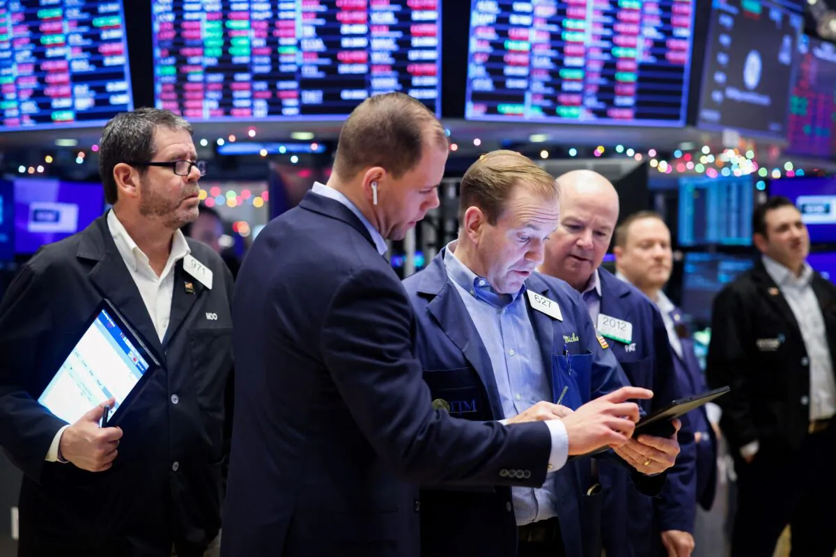 Traders work on the trading floor at the New York Stock Exchange on Jan. 5, 2023. (Andrew Kelly/Reuters)