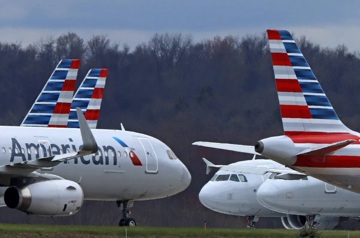 American Airlines planes sit stored at Pittsburgh International Airport in Imperial, Pa., on March 31, 2020. (Gene J. Puskar/AP Photo)