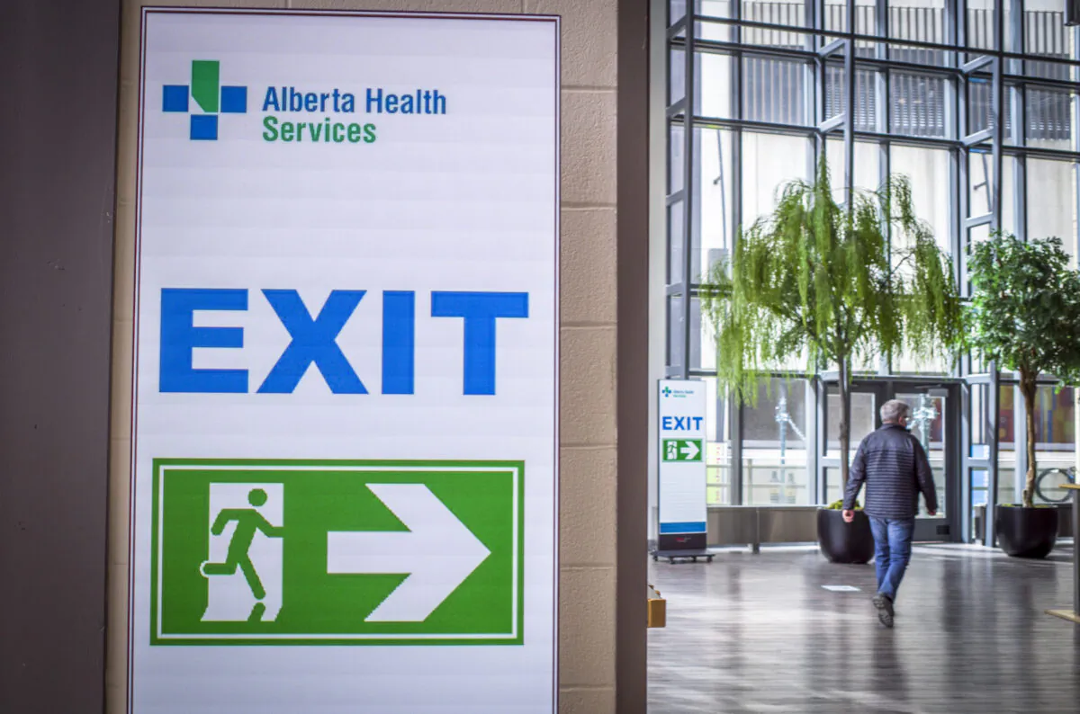 An Albertan exits a mass COVID-19 vaccination clinic in Calgary, Alta., Thursday, April 22, 2021. THE CANADIAN PRESS/Jeff McIntosh