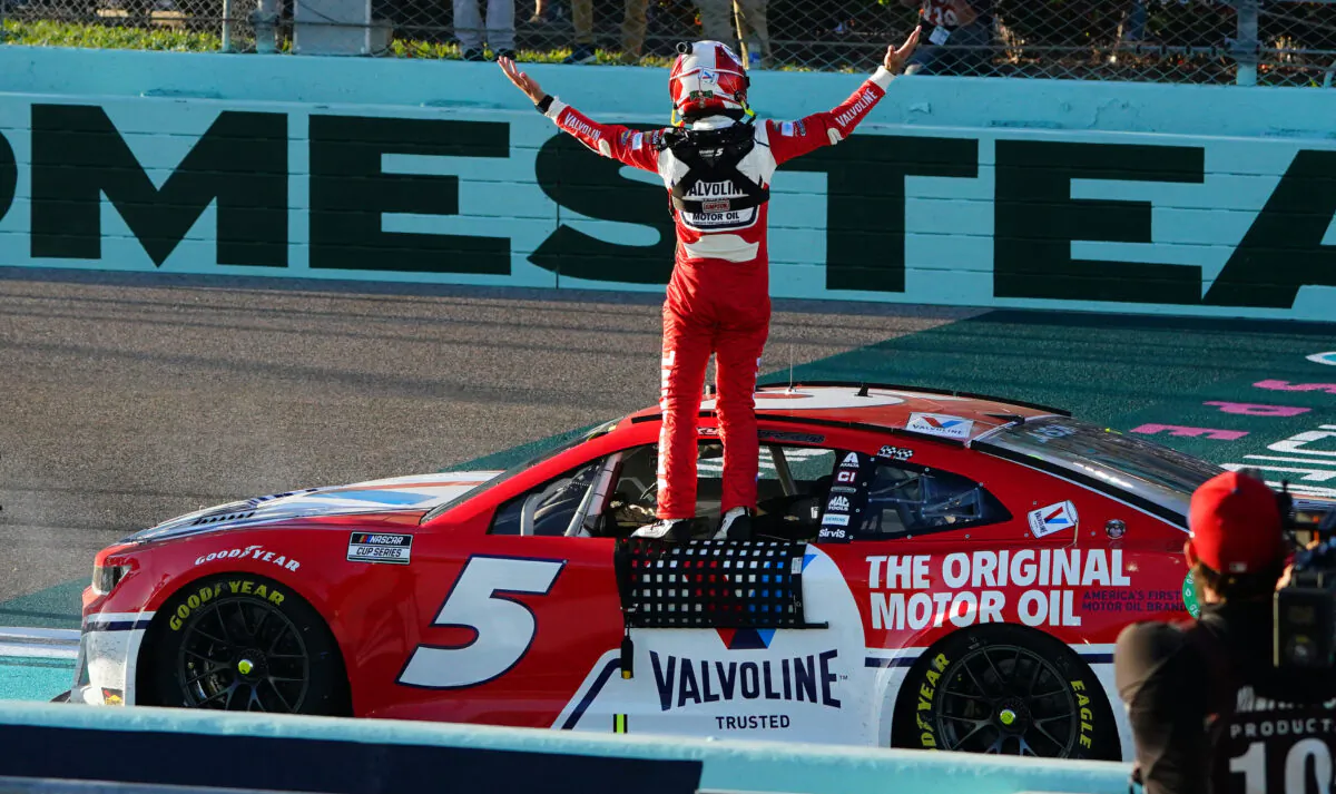 NASCAR Cup Series driver Kyle Larson (5) celebrates winning the Dixie Vodka 400 at Homestead-Miami Speedway in Homestead, Fla., on Oct. 23, 2022. (John David Mercer/USA TODAY Sports via Reuters)