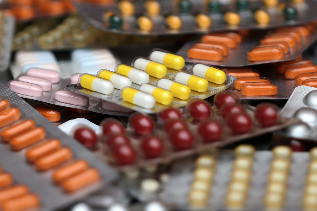 Various medicine pills in their original packaging in Brussels on Aug. 9, 2019. (Yves Herman/Illustration/Reuters)