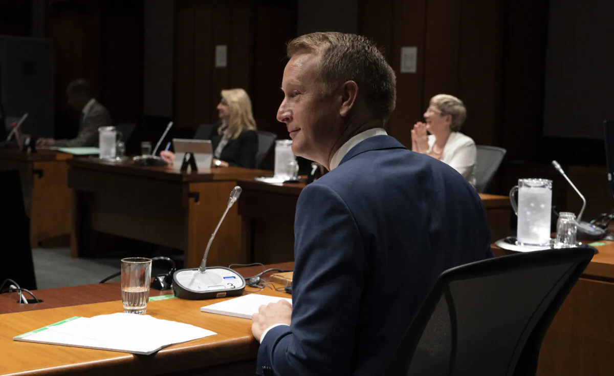Chris Warkentin waits to begin a session of the House of Commons Access to Information, Privacy and Ethics committee on Parliament hill in Ottawa, July 12, 2021. (Adrian Wyld/The Canadian Press)
