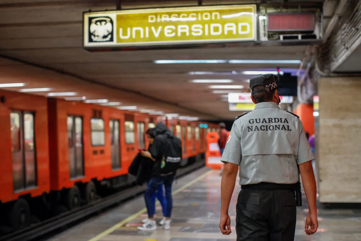 A member of the National Guard walks at a metro platform as part of a deployment to stations and other facilities of the metro system after a series of incidents, in Mexico City on Jan. 12, 2023. (Raquel Cunha/Reuters)