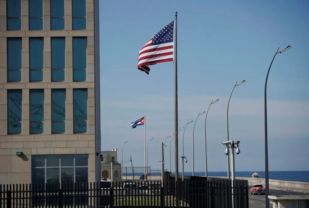 The U.S. flag is seen beside a U.S. Embassy in a file photo (Alexandre Meneghini/Reuters)