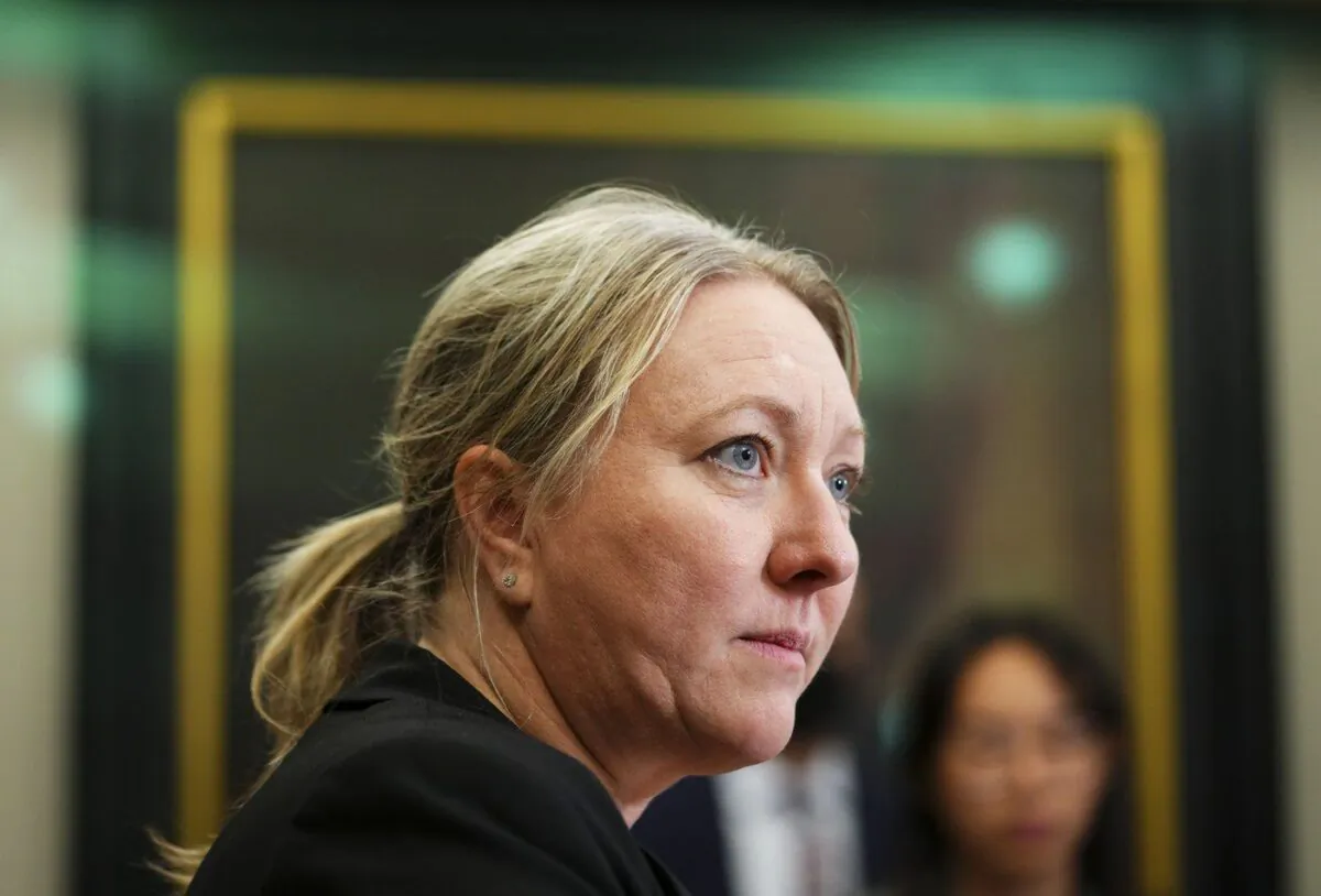 President of the Treasury Board Mona Fortier speaks in the foyer of the House of Commons on Parliament Hill in Ottawa on Dec. 15, 2022. (Sean Kilpatrick/The Canadian Press)