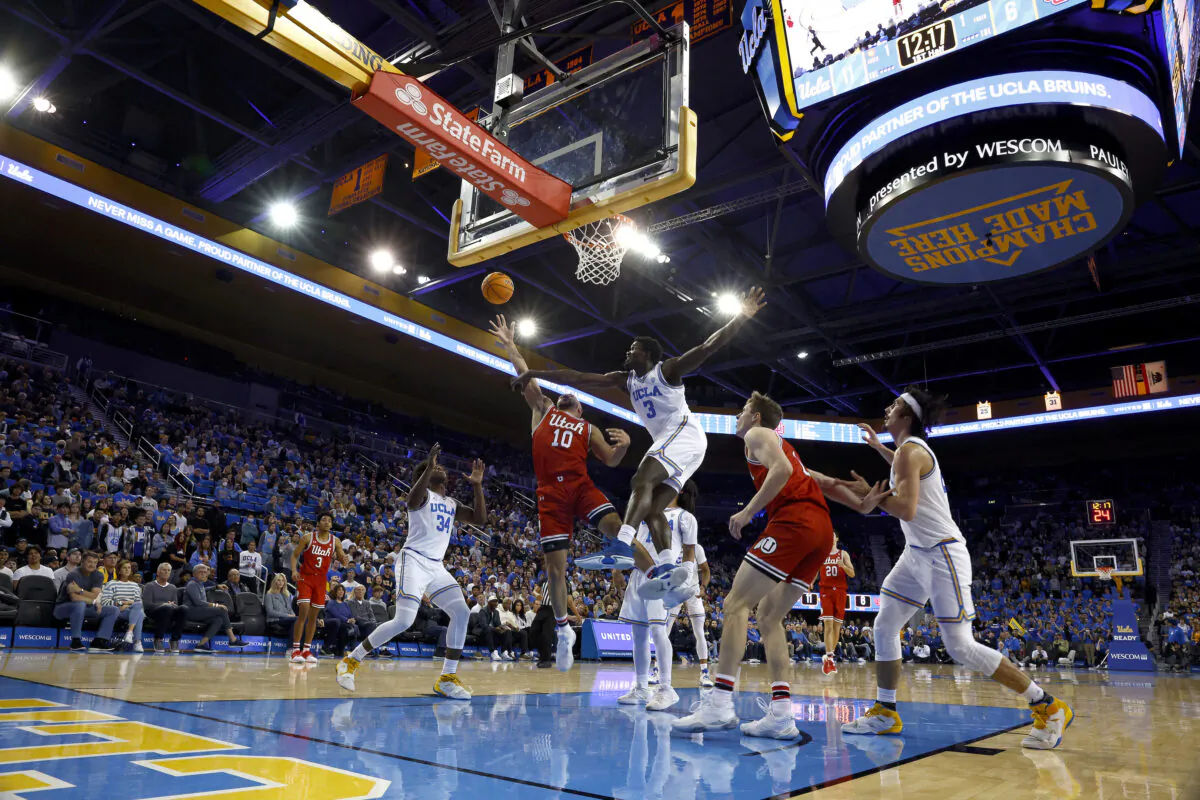 Marco Anthony (10) of the Utah Utes takes a shot against Adem Bona (3) of the UCLA Bruins in the first half at UCLA Pauley Pavilion in Los Angeles on Jan. 12, 2023. (Ronald Martinez/Getty Images)
