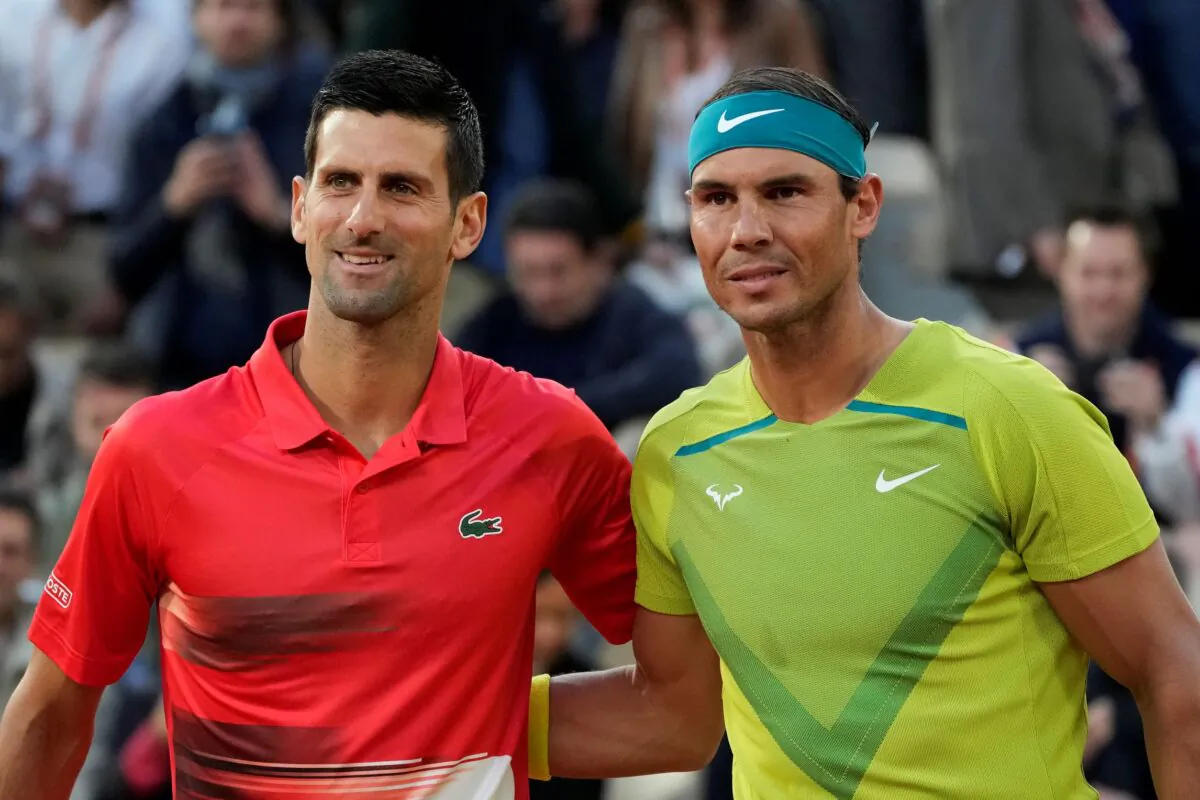 Serbia's Novak Djokovic (L) and Spain's Rafael Nadal pose ahead of their quarterfinal match at the French Open tennis tournament in Paris, France, on May 31, 2022. (Christophe Ena/AP Photo)