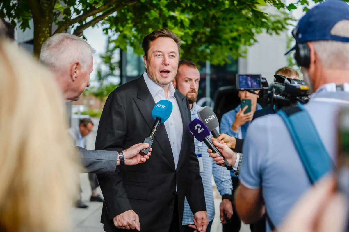 Elon Musk gives interviews as he arrives at the Offshore Northern Seas 2022 meeting in Stavanger, Norway, on Aug. 29, 2022. (CARINA JOHANSEN/NTB/AFP via Getty Images)