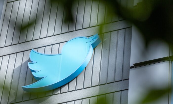 The Twitter logo is seen on a sign on the exterior of Twitter headquarters in San Francisco, Calif., on Oct. 28, 2022. (Constanza Hevia/AFP via Getty Images)