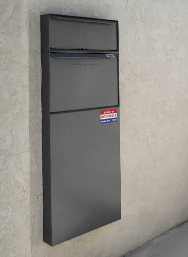 You can have a built-in locking parcel box in a sturdy fence or an exterior wall of your house. (Gene Hamilton/TNS)