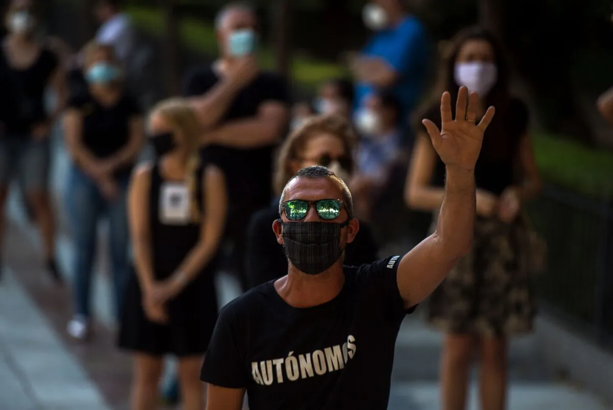Freelancers demonstrate for their rights in Seville, Spain, after nearly three months the country's economy was paralysed by lockdown to stop the spread of the novel coronavirus, on June 27, 2020. (Cristina Quicler/AFP via Getty Images)