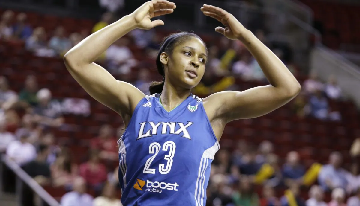 Minnesota Lynx's Maya Moore in action against the Seattle Storm in the first half of a WNBA basketball game in Seattle on Sept. 10, 2013. (Elaine Thompson/AP Photo)