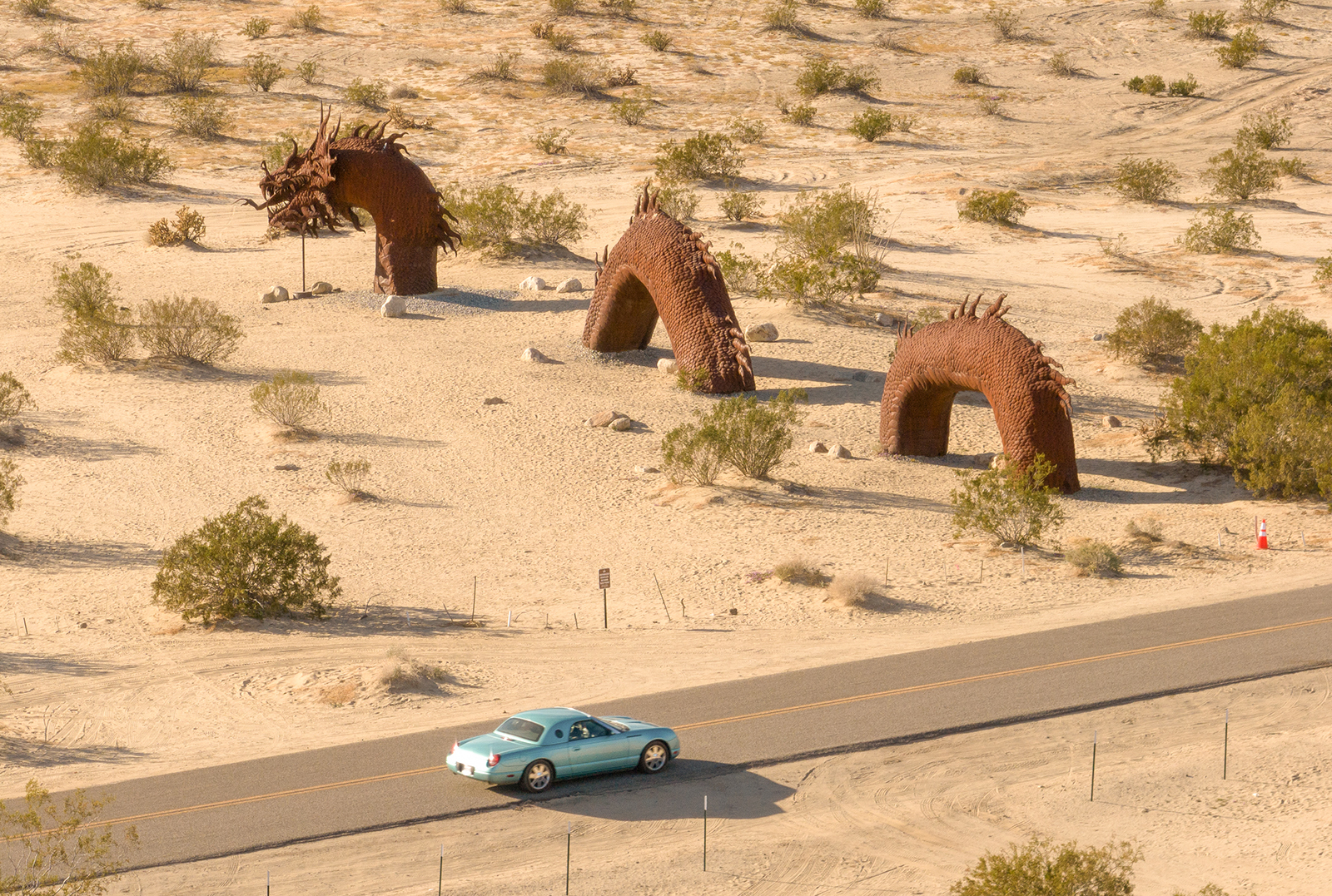 The Borrego Springs serpent sculpture rises from the desert floor at Galleta Meadows.