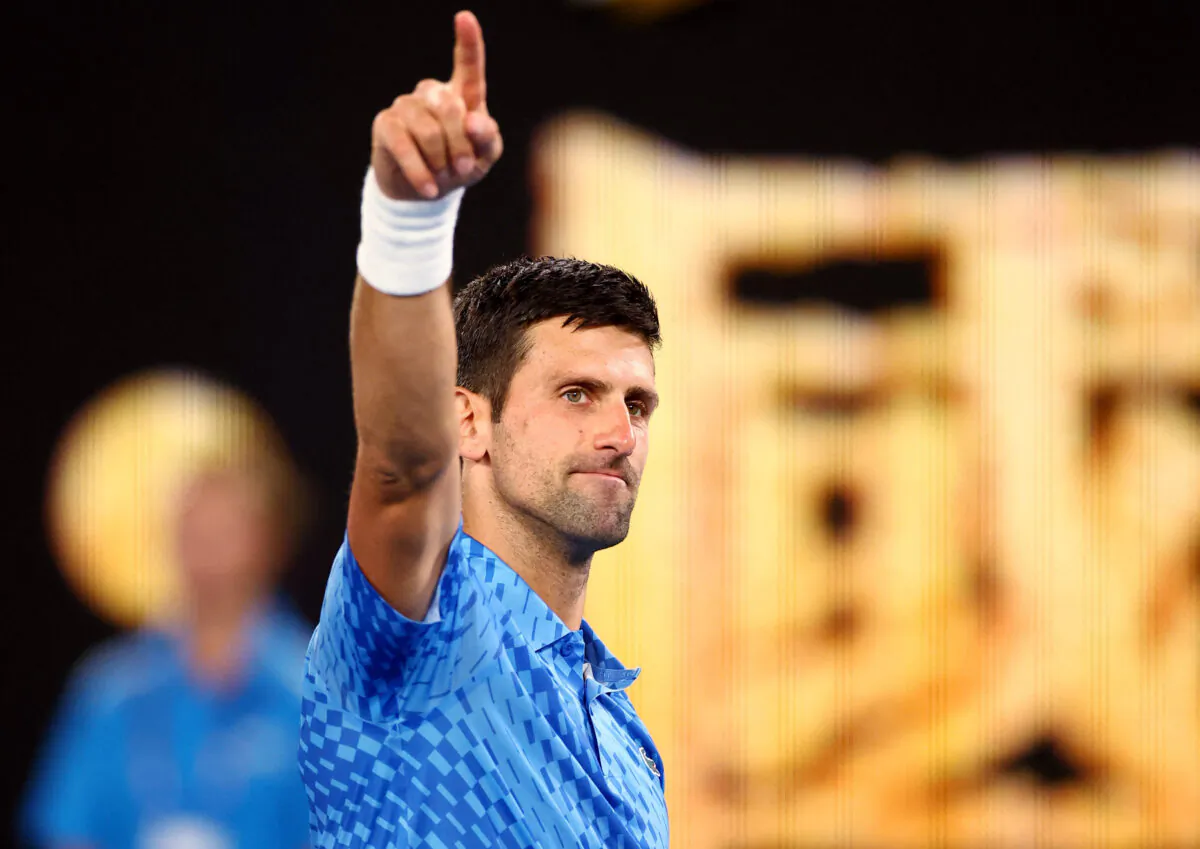 Serbia's Novak Djokovic celebrates winning his first round match against Spain's Roberto Carballes Baena during the Australian Open tennis match at Melbourne Park in Melbourne, Australia, on Jan. 18, 2023. (Carl Recine/Reuters)