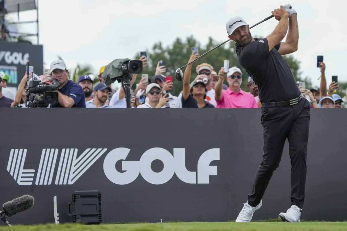 Team Captain Dustin Johnson of 4 Aces GC plays his shot from the third tee during the team championship stroke-play round of the LIV Golf Invitationa—Miami at Trump National Doral Miami in Doral, Fla., on Oct. 30, 2022. (Eric Espada/Getty Images)
