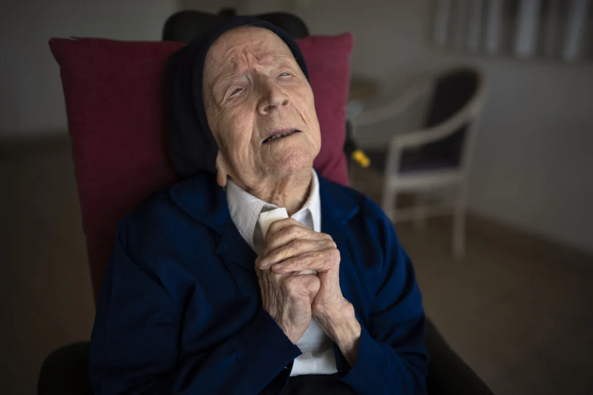 Sister Andre poses for a portrait at the Sainte Catherine Laboure care home in Toulon, southern France, on April 27, 2022. (Daniel Cole/AP Photo)