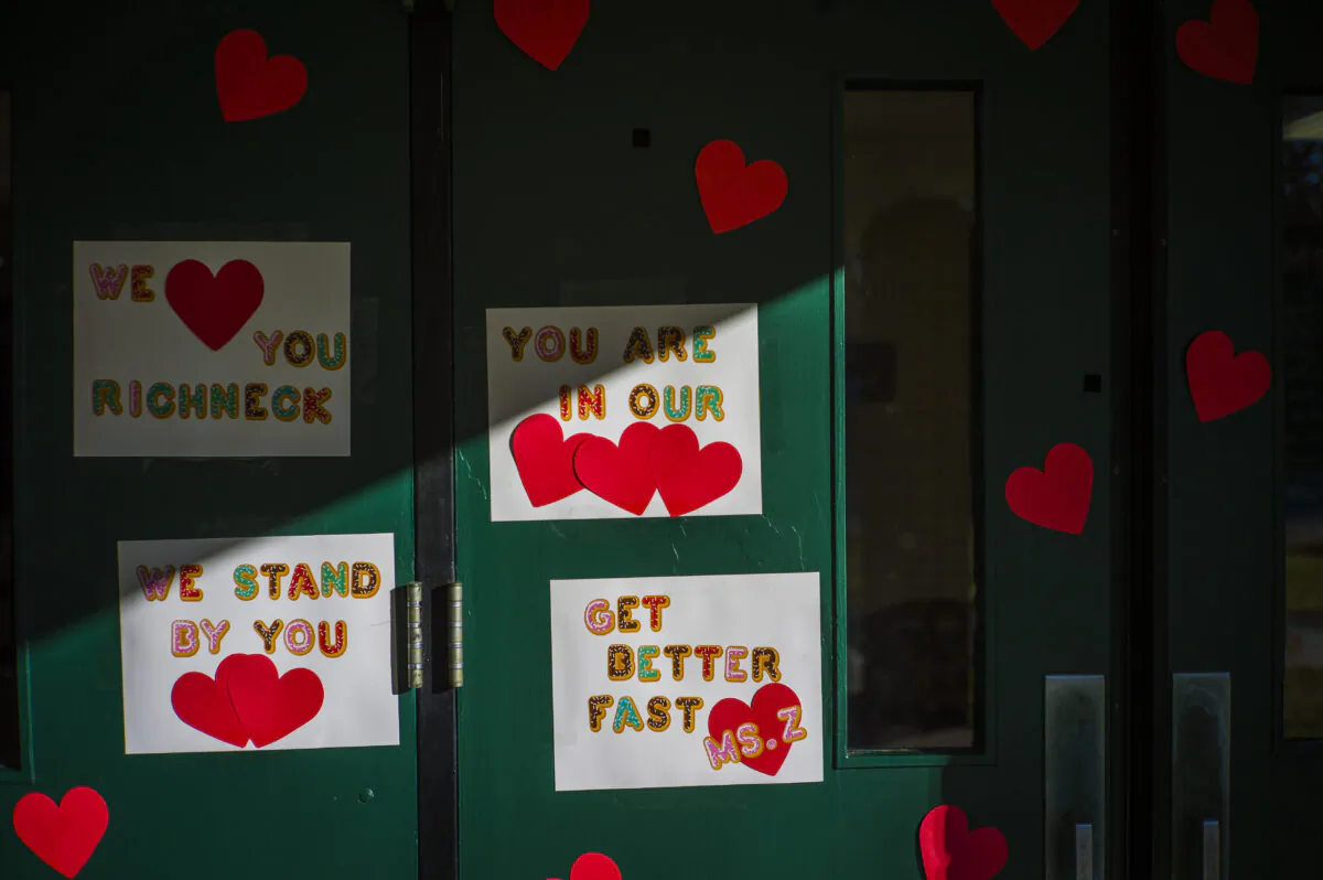 Messages of support for teacher Abby Zwerner, who was shot by a 6-year-old student, grace the front door of Richneck Elementary School in Newport News, Va., on Jan. 9, 2023. (John C. Clark/AP Photo)