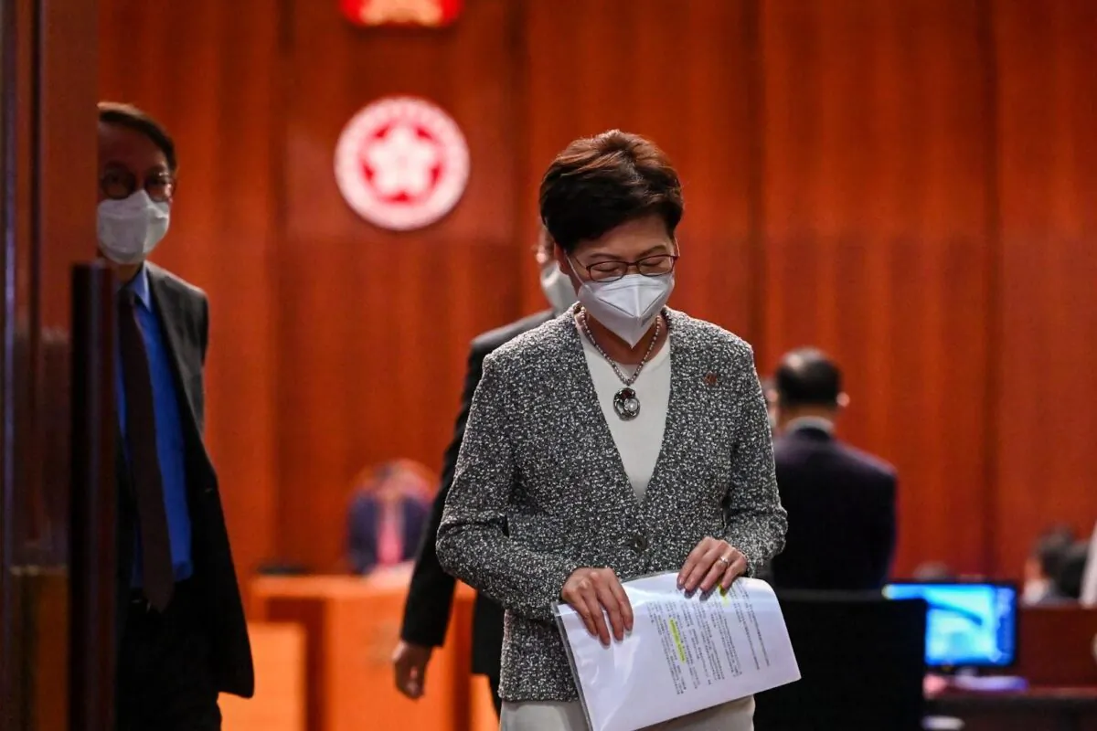 Carrie Lam, Hong Kong's former chief executive, attended the last question-and-answer session of the Legislative Council during her term of office in Hong Kong, on June 9, 2022. (Song Pi-lung/The Epoch Times)