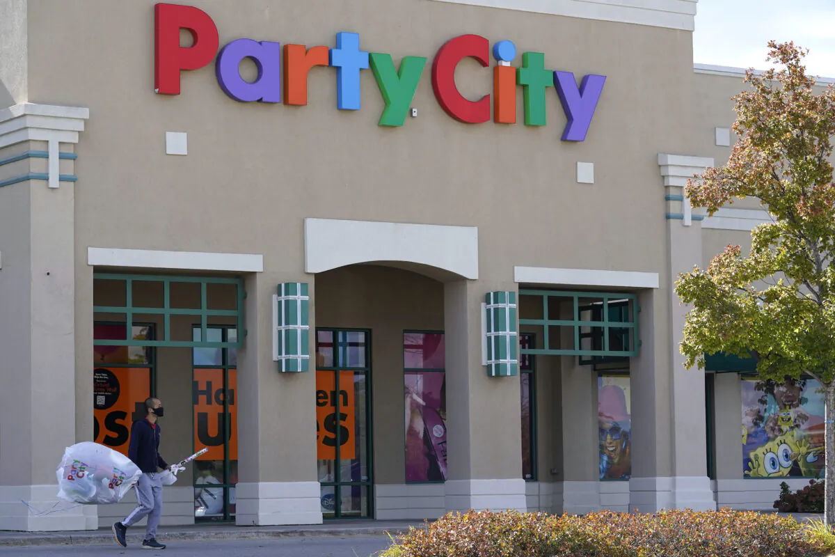 A shopper leaves a Party City store in Vernon Hills, Ill., on Oct. 15, 2020.  (Nam Y. Huh/AP Photo)