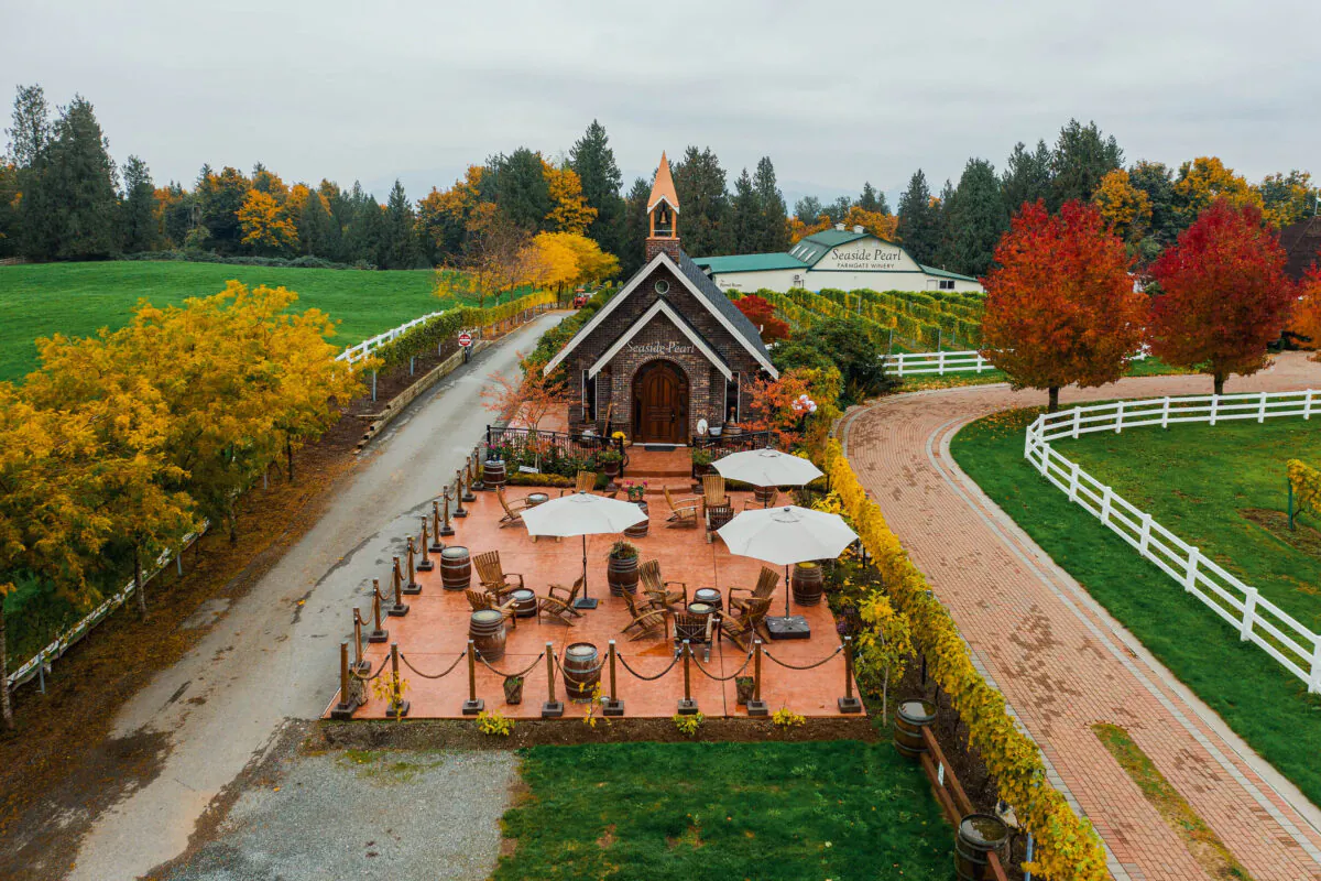 The winery with a unique brick and copper-spired “chapel” tasting facility and casual seating areas is set behind the residence, accented by the equestrian facilities and the vineyards. (Courtesy of Sotheby’s International Realty Canada)
