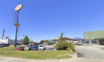 Restaurant Sign Topples in High Wind; 1 Dead, 2 Injured